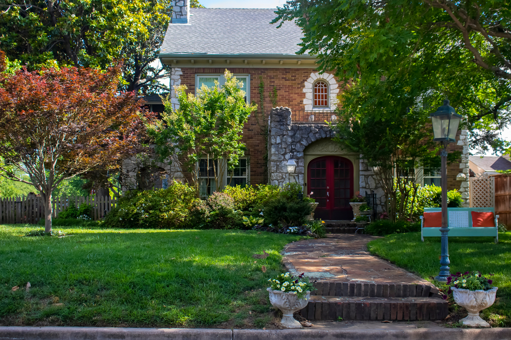 Beautiful,upscale,house,with,rock,castle,like,entrance,and,retro