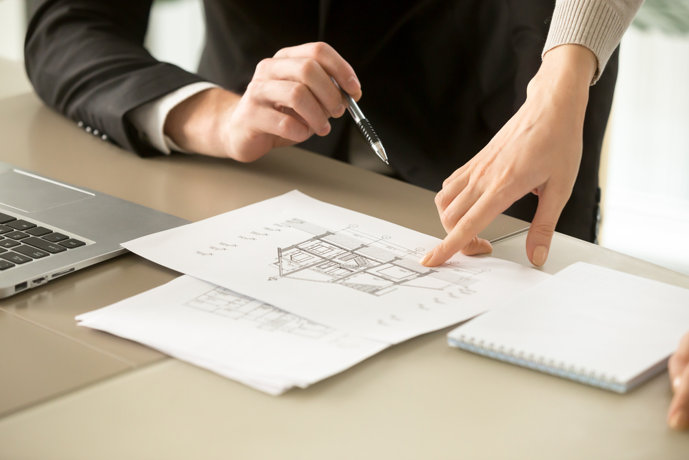 Close,up,view,of,two Story,house,construction,project,,architects,discuss